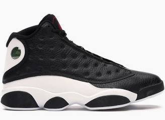 Black high-top sneaker with white sole on a white background